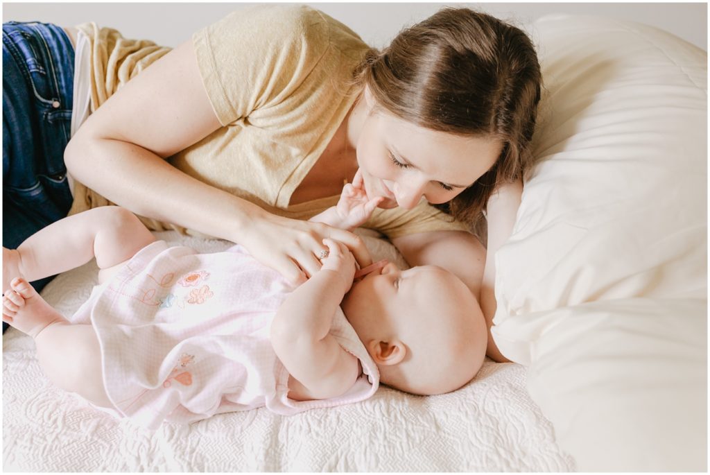 mom cuddling baby girl photo by Alexandra Robyn Photo Design