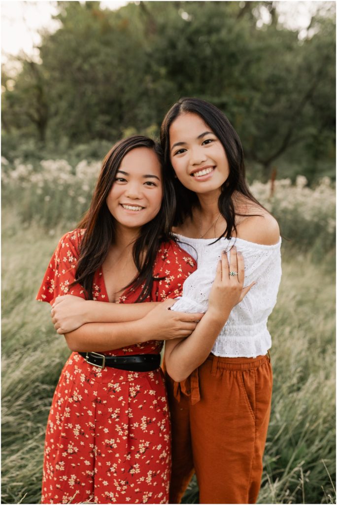 twin girls posing for fall family photos