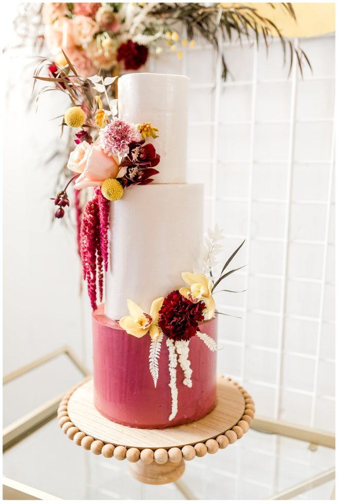 blush wedding cake with florals